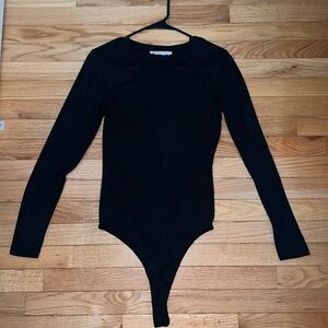 Elodie size medium black body suit. Excellent condition